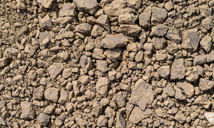 Cracked clay and decomposed granite.