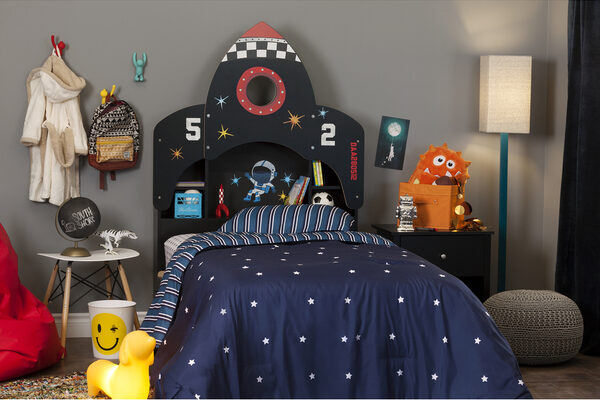 Space-themed children's room featuring a bed with a rocket headboards that reads the numbers 5 and 2 on either side.