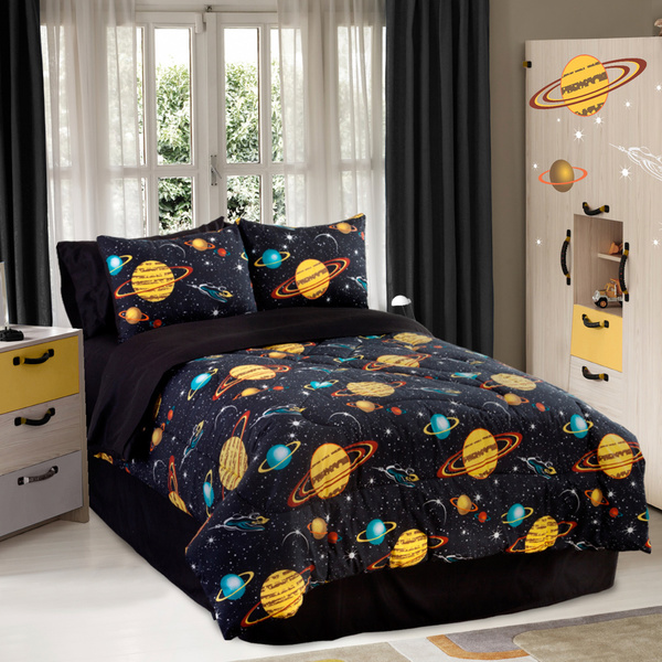 Space children's room with a space galaxy comforter.