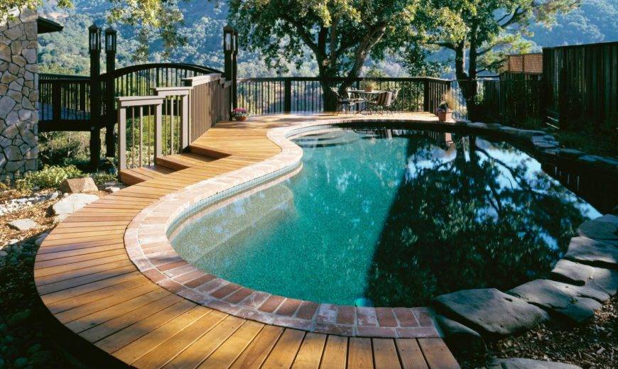 Make A Splash With These Stylish Wood Pool Deck Ideas